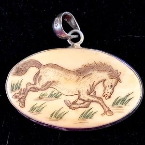 Horse Pendent.  Sterling Marked.    . Perfect condition 
On bone

Vintage